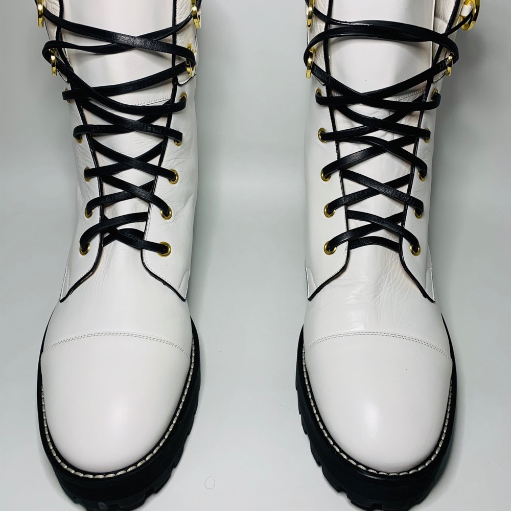 Stewart Weitzman lexy combat boots made in Spain